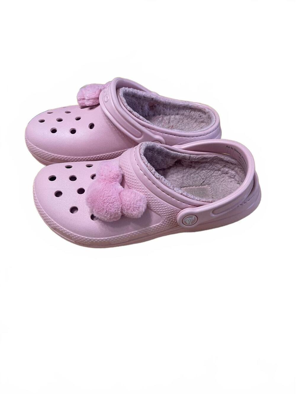Disney Parks branded pink Crocs